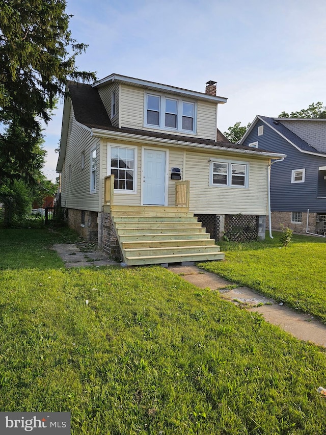 5309 Liberty Heights Ave, Baltimore, MD 21207 - back of property with a chimney and a lawn