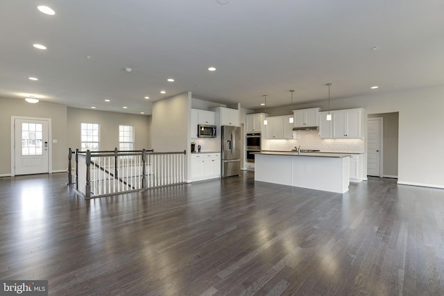 11701 Moriarty Ct, Bowie, MD 20720 - unfurnished living room featuring dark wood-style flooring and recessed lighting