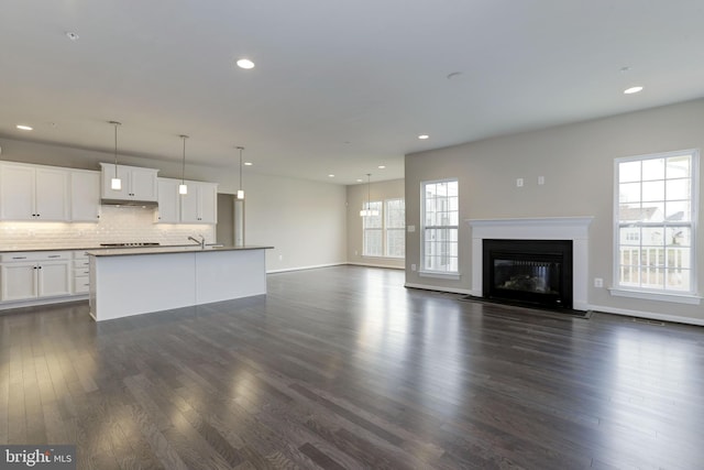 11701 Moriarty Ct, Bowie, MD 20720 - unfurnished living room with dark wood-type flooring, a fireplace with flush hearth, and recessed lighting