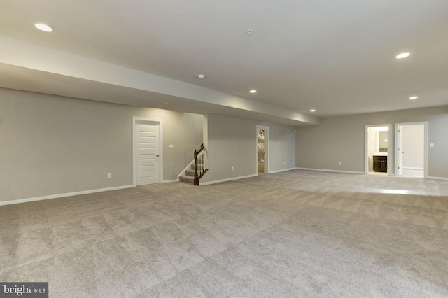 11701 Moriarty Ct, Bowie, MD 20720 - finished below grade area with stairs, recessed lighting, and light carpet