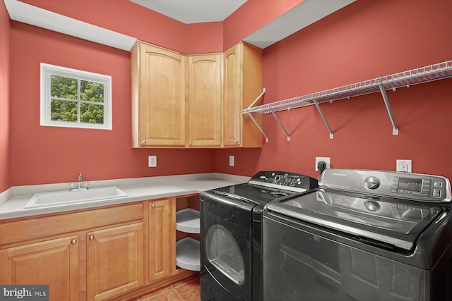 14014 Mary Bowie Pkwy, Upper Marlboro, MD 20774 - laundry room with cabinet space, independent washer and dryer, and light tile patterned flooring