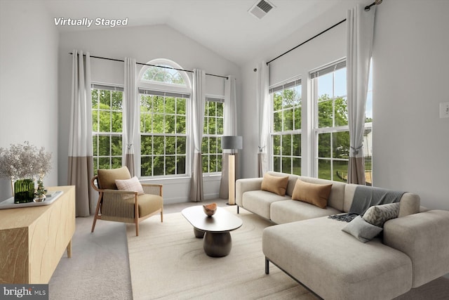 14014 Mary Bowie Pkwy, Upper Marlboro, MD 20774 - living room with vaulted ceiling and light colored carpet
