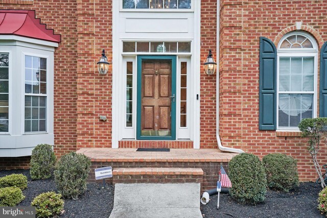 14014 Mary Bowie Pkwy, Upper Marlboro, MD 20774 - doorway to property featuring brick siding