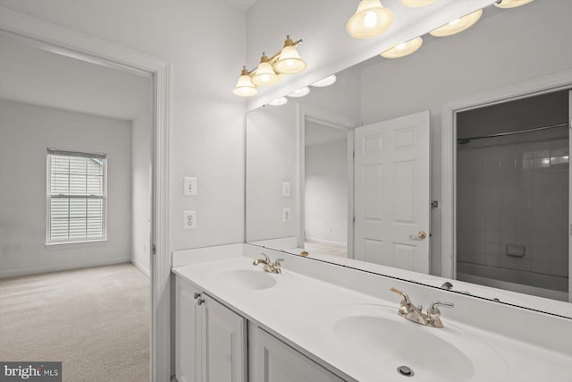 14014 Mary Bowie Pkwy, Upper Marlboro, MD 20774 - full bathroom featuring double vanity and baseboards
