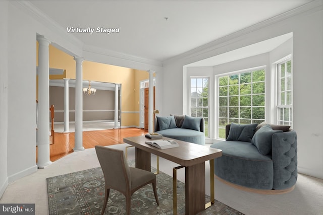 14014 Mary Bowie Pkwy, Upper Marlboro, MD 20774 - living room featuring crown molding, decorative columns, and a chandelier