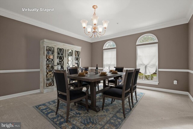14014 Mary Bowie Pkwy, Upper Marlboro, MD 20774 - carpeted dining room with a chandelier and crown molding