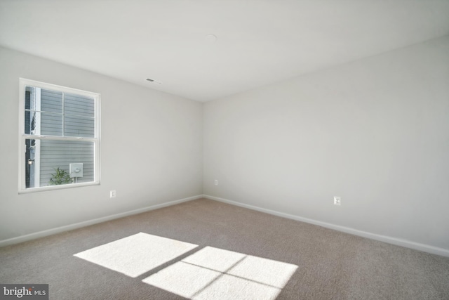 163 Angus Rd, Charles Town, WV 25414 - carpeted empty room with baseboards