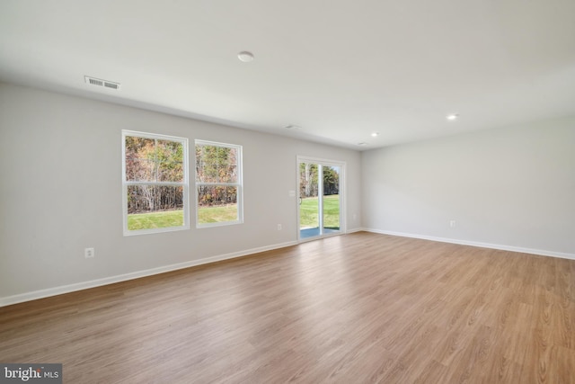 163 Angus Rd, Charles Town, WV 25414 - spare room featuring baseboards, light wood-style floors, and recessed lighting