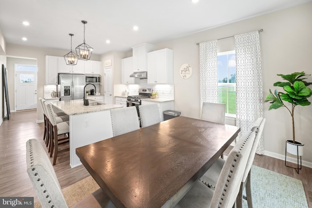 57 Oak Ln, Carneys Point, NJ 08069 - dining area featuring light wood-type flooring and recessed lighting