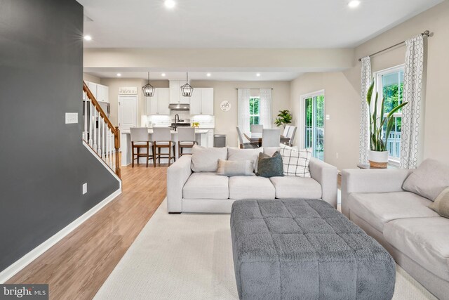 57 Oak Ln, Carneys Point, NJ 08069 - living room with recessed lighting, light wood-style flooring, and stairway