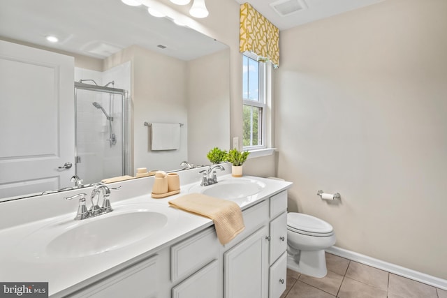 57 Oak Ln, Carneys Point, NJ 08069 - bathroom with double vanity, a stall shower, and tile patterned flooring
