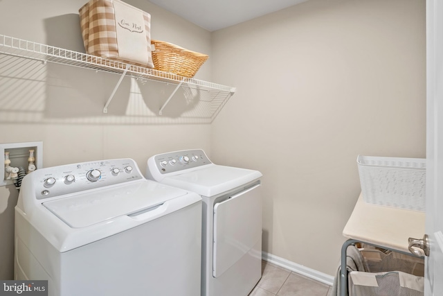57 Oak Ln, Carneys Point, NJ 08069 - laundry room featuring washing machine and dryer and light tile patterned floors