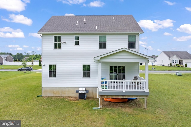 57 Oak Ln, Carneys Point, NJ 08069 - rear view of property featuring a yard