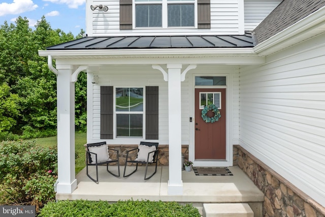 57 Oak Ln, Carneys Point, NJ 08069 - doorway to property with a porch, a standing seam roof, and a metal roof