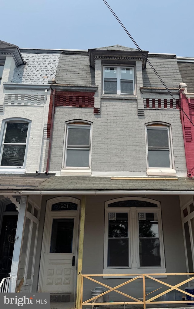 521 Windsor St, Reading, PA 19601 - view of property featuring brick siding