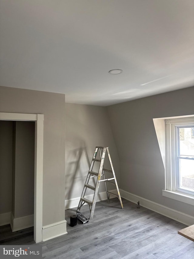 521 Windsor St, Reading, PA 19601 - rec room with wood finished floors and baseboards