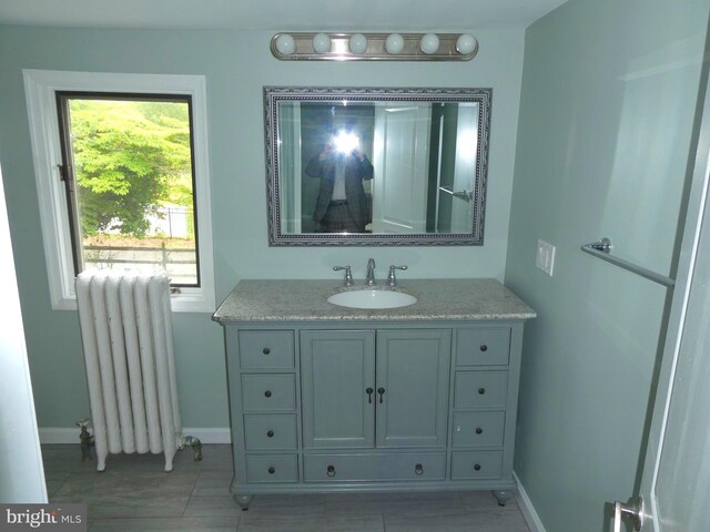 126 E Central Ave, Hammonton, NJ 08037 - bathroom with radiator and vanity
