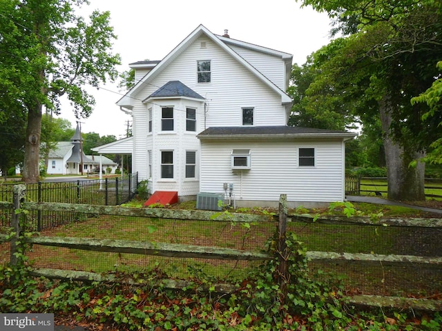 126 E Central Ave, Hammonton, NJ 08037 - rear view of house with a fenced backyard