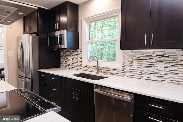 6309 Ember Ct, Manassas, VA 20112 - kitchen featuring stainless steel appliances, decorative backsplash, and light countertops