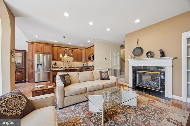 272 Center Point Ln, Lansdale, PA 19446 - living room featuring recessed lighting, light wood finished floors, and a premium fireplace