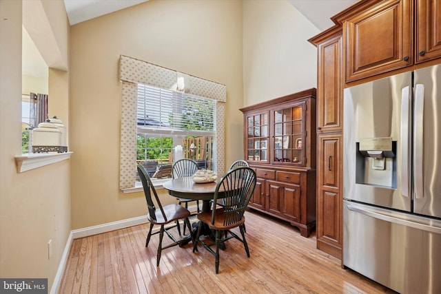 272 Center Point Ln, Lansdale, PA 19446 - dining space featuring light wood finished floors and high vaulted ceiling