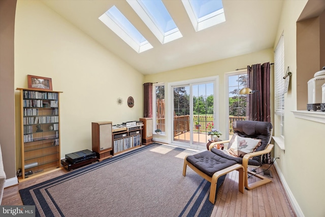 272 Center Point Ln, Lansdale, PA 19446 - sitting room with a skylight, wood finished floors, and high vaulted ceiling