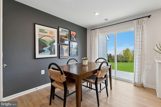 219 Olympus Rd, Charles Town, WV 25414 - dining room featuring light wood-style flooring and baseboards