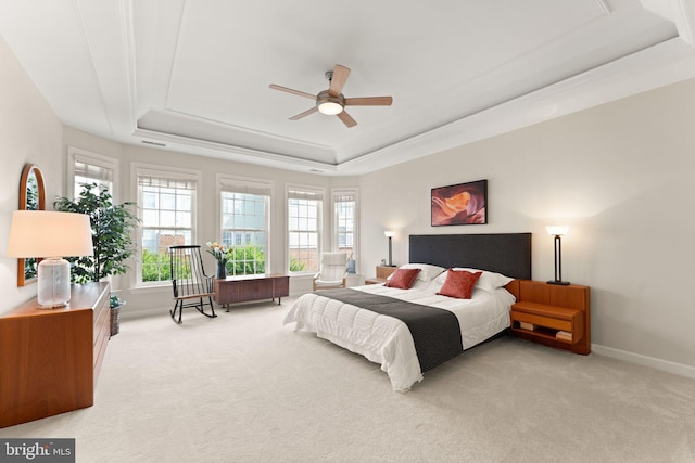 43665 Jernigan Ter, Leesburg, VA 20176 - bedroom with a tray ceiling, light colored carpet, and ceiling fan