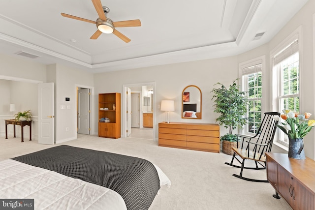 43665 Jernigan Ter, Leesburg, VA 20176 - bedroom featuring a raised ceiling, light colored carpet, ceiling fan, and ensuite bath