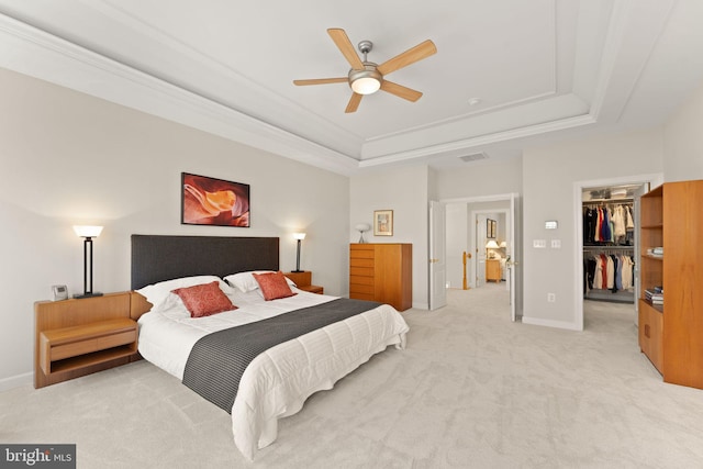 43665 Jernigan Ter, Leesburg, VA 20176 - bedroom with a raised ceiling, light carpet, a spacious closet, a closet, and ceiling fan