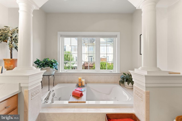 43665 Jernigan Ter, Leesburg, VA 20176 - bathroom featuring ornate columns, a tub with jets, and vanity