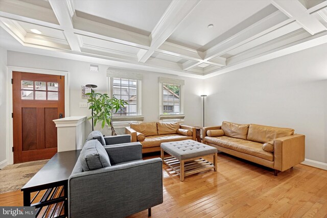 121 Valley Pl, Media, PA 19063 - living room with coffered ceiling, light wood finished floors, beam ceiling, and crown molding