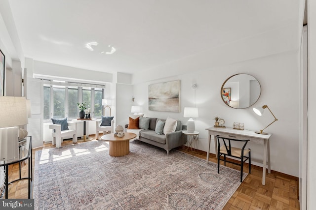 1711 Massachusetts Ave NW Unit 230, Washington, DC 20036 - living room with baseboards and a desk