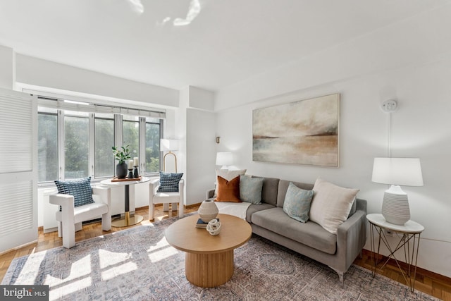 1711 Massachusetts Ave NW Unit 230, Washington, DC 20036 - living room featuring baseboards