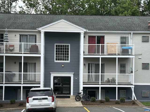 545 Burgoyne Rd Unit 8, Charlottesville, VA 22901 - view of building exterior featuring uncovered parking