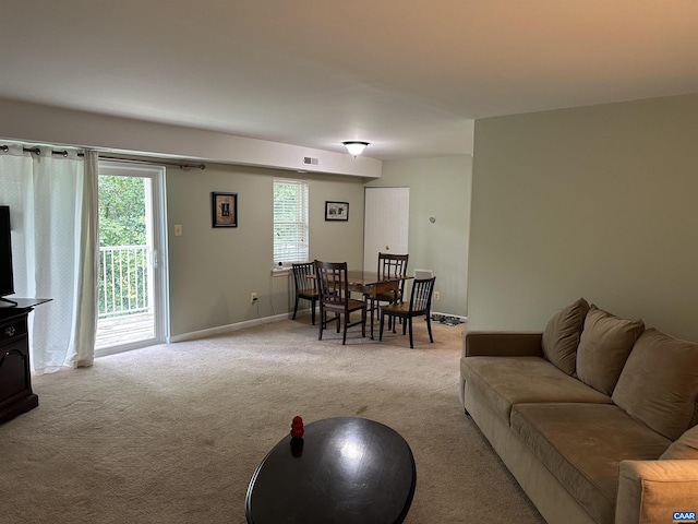 545 Burgoyne Rd Unit 8, Charlottesville, VA 22901 - carpeted living room featuring baseboards