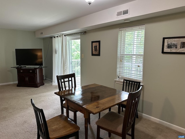545 Burgoyne Rd Unit 8, Charlottesville, VA 22901 - dining room with light carpet and plenty of natural light