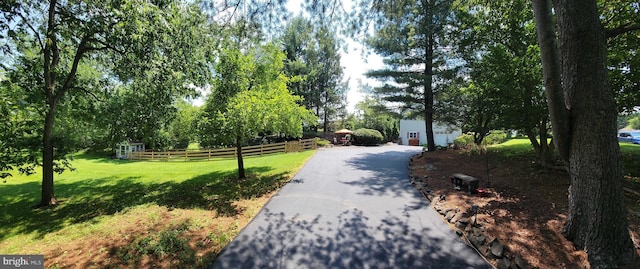 4367 Sunset Ct, Warrenton, VA 20187 - view of home's community with view of scattered trees, driveway, and a garage