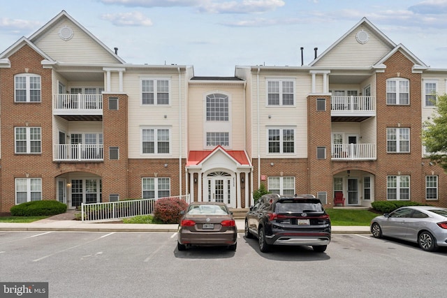 6230 Glen Valley Ter Unit 4L, Frederick, MD 21701 - view of building exterior with uncovered parking
