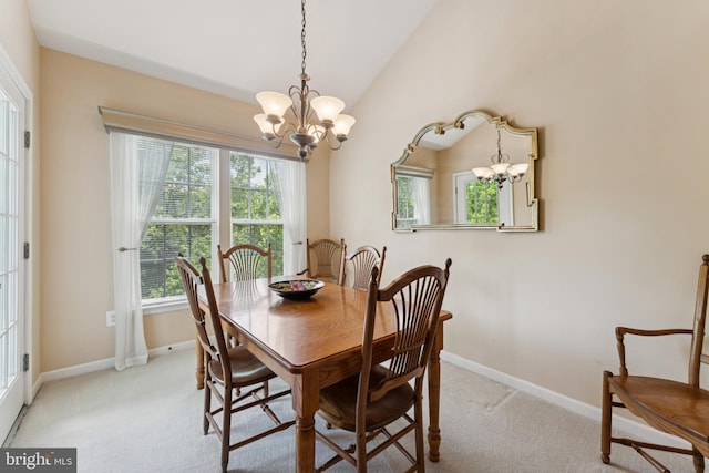 6230 Glen Valley Ter Unit 4L, Frederick, MD 21701 - dining area featuring a chandelier, carpet flooring, and vaulted ceiling