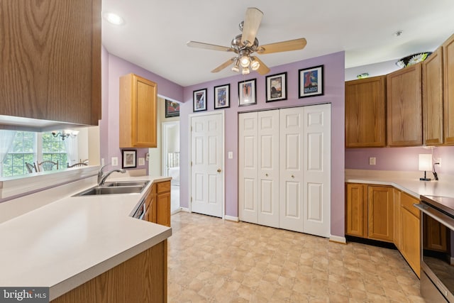 6230 Glen Valley Ter Unit 4L, Frederick, MD 21701 - kitchen with stainless steel range oven, light countertops, a ceiling fan, brown cabinets, and a peninsula
