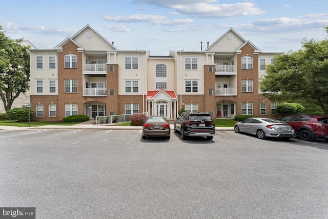 6230 Glen Valley Ter Unit 4L, Frederick, MD 21701 - view of building exterior with uncovered parking