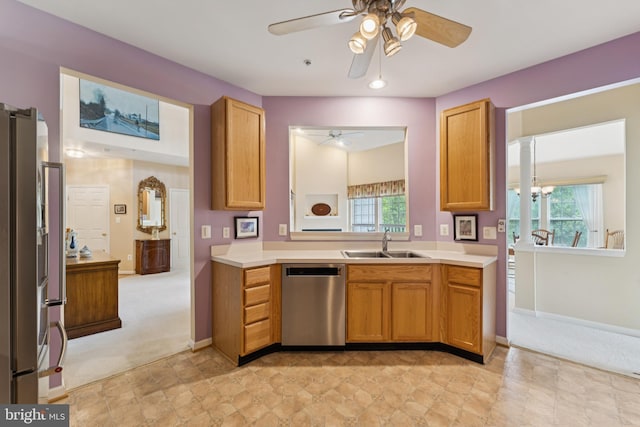 6230 Glen Valley Ter Unit 4L, Frederick, MD 21701 - kitchen featuring appliances with stainless steel finishes, ceiling fan, light countertops, and light colored carpet