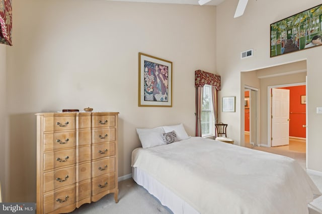 6230 Glen Valley Ter Unit 4L, Frederick, MD 21701 - bedroom with light carpet, a towering ceiling, and ceiling fan