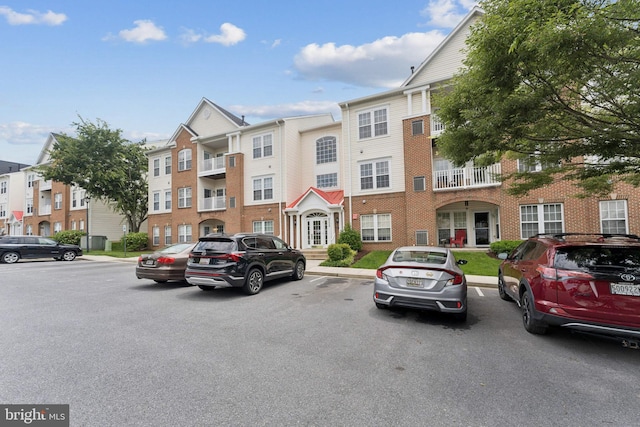 6230 Glen Valley Ter Unit 4L, Frederick, MD 21701 - view of building exterior with uncovered parking