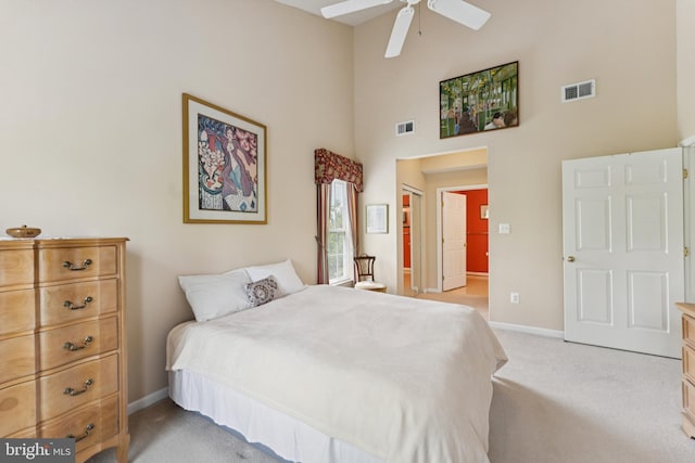 6230 Glen Valley Ter Unit 4L, Frederick, MD 21701 - bedroom with light colored carpet, a towering ceiling, and a ceiling fan