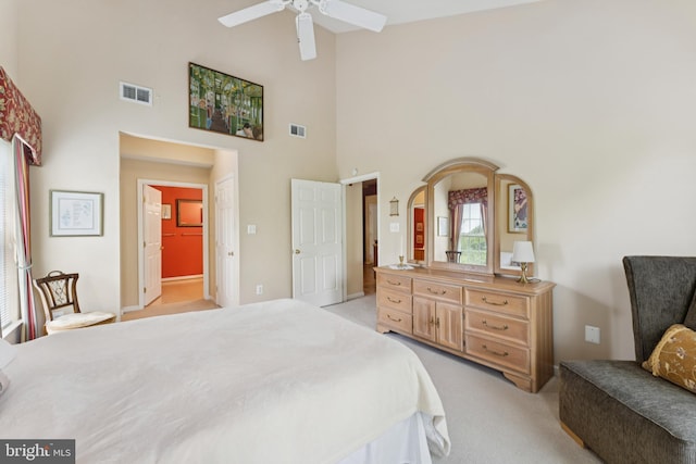 6230 Glen Valley Ter Unit 4L, Frederick, MD 21701 - bedroom featuring light carpet, a towering ceiling, and a ceiling fan