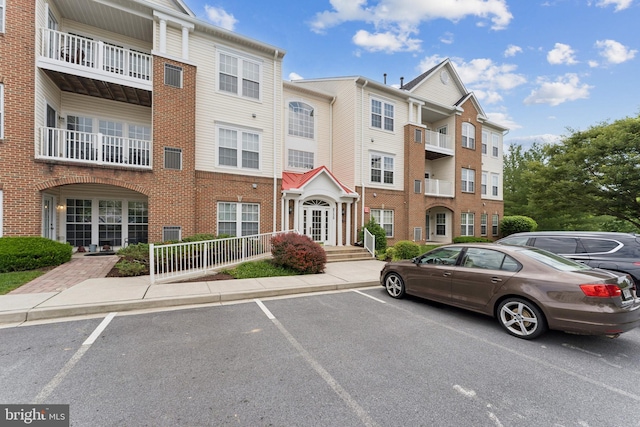 6230 Glen Valley Ter Unit 4L, Frederick, MD 21701 - view of building exterior featuring uncovered parking