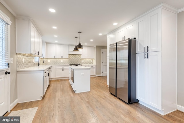 2100 Pot Spring Rd, Lutherville Timonium, MD 21093 - kitchen with appliances with stainless steel finishes, light countertops, white cabinetry, decorative backsplash, and recessed lighting