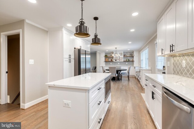 2100 Pot Spring Rd, Lutherville Timonium, MD 21093 - kitchen featuring appliances with stainless steel finishes, decorative backsplash, recessed lighting, light wood finished floors, and white cabinets